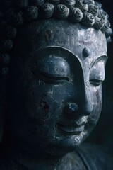 Close-up of weathered Buddha statue face (2)