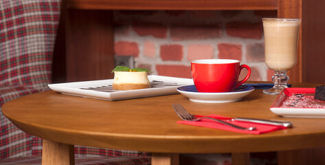 Gourmet Cheesecake and Coffee Selection in Cafe