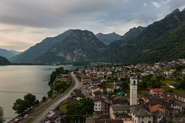 Fototapeta premium Aerial view of Pian di Spagna nature reserve and Lake Mezzola landscape with mountains and wetlands in Lombardy Italy