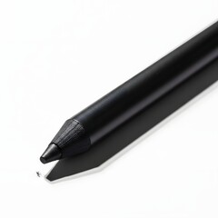 A black mechanical pencil with a sharp tip and lead point