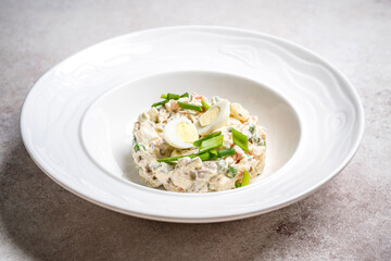 Classic Olivier Salad Served In White Plate