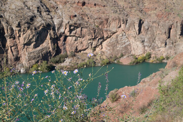 A river runs through a canyon in the mountains	
