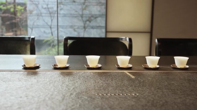 row of tea cup on table