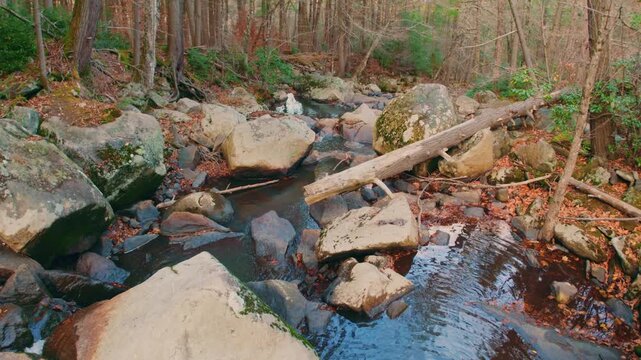 Footage capturing the powerful waters of Glendale Brook as they cascade over rocky ledges and boulders at Glendale Falls, one of Massachusetts' tallest and longest waterfall runs.