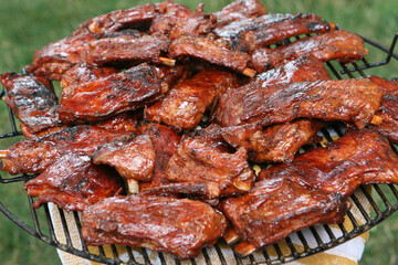 Columbus Ohio July 4, 2022  A grill full of freshly cooked barbeque ribs