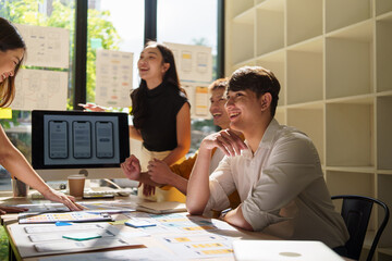 Health consultant conducting a virtual session, holding an apple as she discusses food choices. Concept of telehealth, and remote wellness.