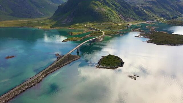 Coastal road and bridge over turquoise waters in the Lofoten Archipelago