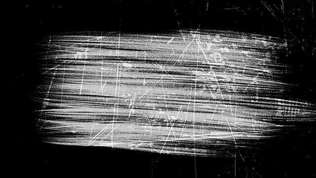 The surface of the hatching is made of thin lines with a pencil by hand with traces of scratches, black and white background