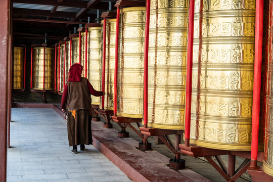 Prayer wheel around the large Mani stone pile on Gerima village, Tagong (Lhagang), Garz&ecirc; Tibetan Autonomous Prefecture, Sichuan,  China