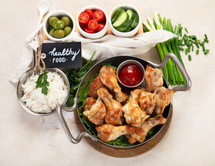 Grilled chicken wings with salt, spices and herbs.