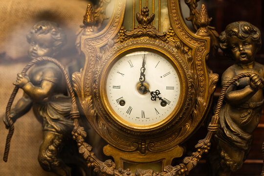 Ornate Antique Bronze Mantel Clock with Cherub Sculptures