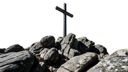 A rocky mountain peak with a tall metal pole and cross