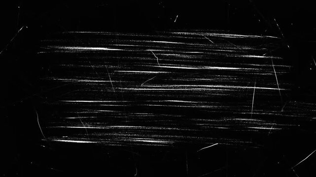 The surface of the hatching of fine lines in pencil by hand with particles of noise, black background