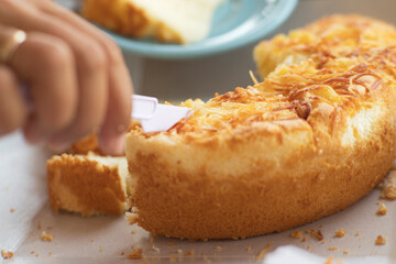 Serving Savory Cake on Blue Plate Background