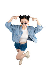 Full body shot of a fashionable woman giving a double gesture. She is wearing cool shades in studio. PNG