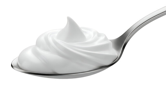 Spoonful of creamy white yogurt or whipped cream dessert