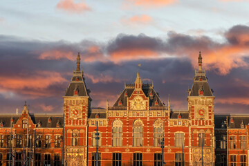 amsterdam central station at sunset