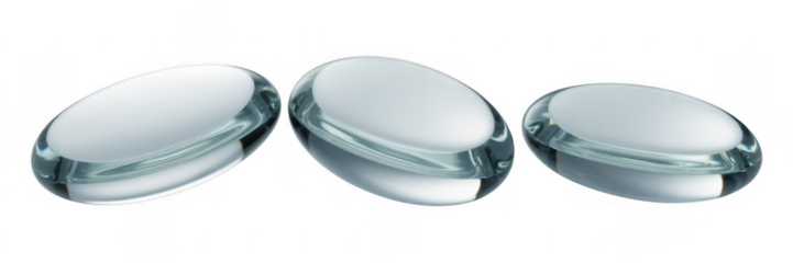 Three clear contact lenses isolated on a transparent background