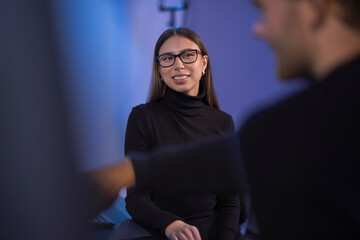 Professional Team Collaborating in a Technology Work Environment for Cybersecurity Tasks