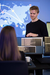 Cybersecurity team managing threat analysis operations in SOC workstation environment