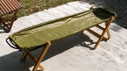 Olive stretcher outdoors on a white cloth with natural light