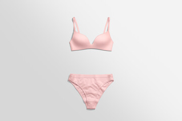 Blank pink lingerie complect bra and bikini mockup, top view