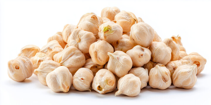 pile of peeled pio nuts with a smooth, light color on a white background
