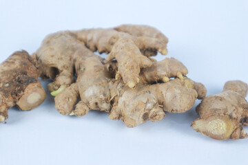 Fresh ginger root isolated on a white background