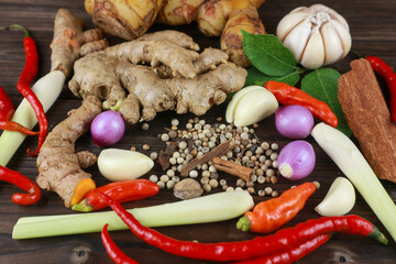 A variety of fresh spices: chili, pepper, garlic, shallot, lemongrass, turmeric, ginger