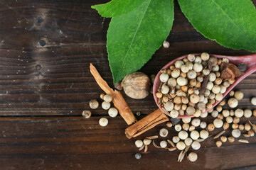 Top view Close up Fresh white pepper on wooden plank background. copy space for text design