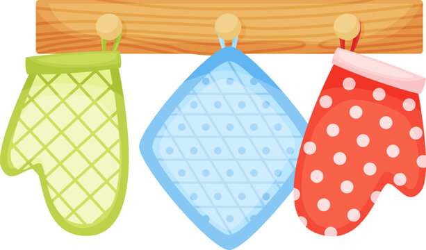 Kitchen oven mitts and pot holder hanging on rack