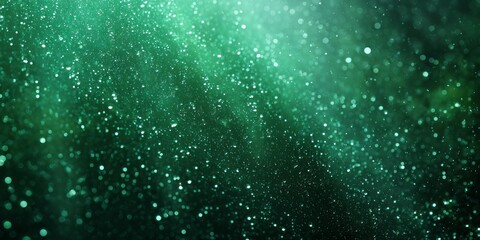 Dynamic cascade of bright particles illuminates a rich, dark teal background texture.