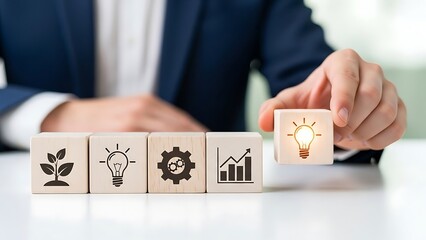 Businessman placing a wooden block with a lightbulb and upward arrow symbolizing innovative growth and strategy in a professional setting