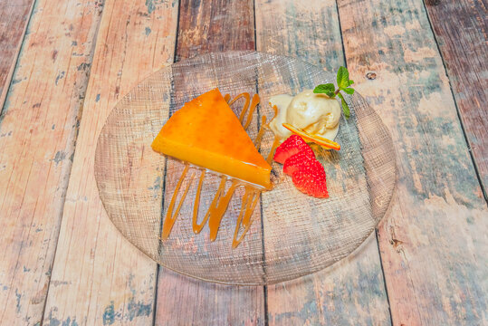 Tocino de Cielo with a hint of orange, where citrus zest infuses the egg yolk mixture, offering a tangy contrast to the dessert's intense sweetness.