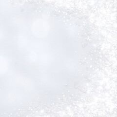 Dreamy winter background with soft glowing bokeh lights and snowflakes with copyspace