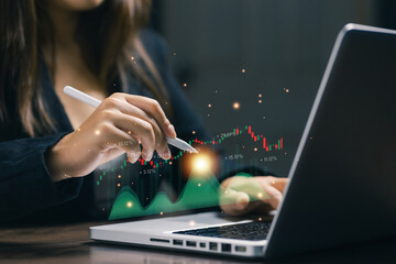A professional analyzes a financial chart on a laptop with a digital dashboard overlay, representing market analysis, trading performance, investment strategy, and data-driven decisions.