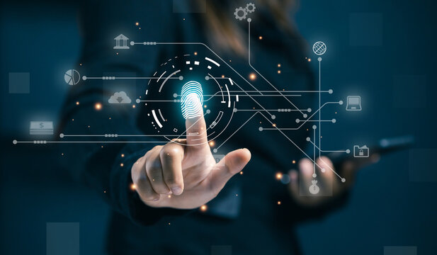 A professional authenticates with a digital fingerprint interface, representing cybersecurity, secure access, identity verification, data protection, and advanced business security systems. - Powered by Adobe