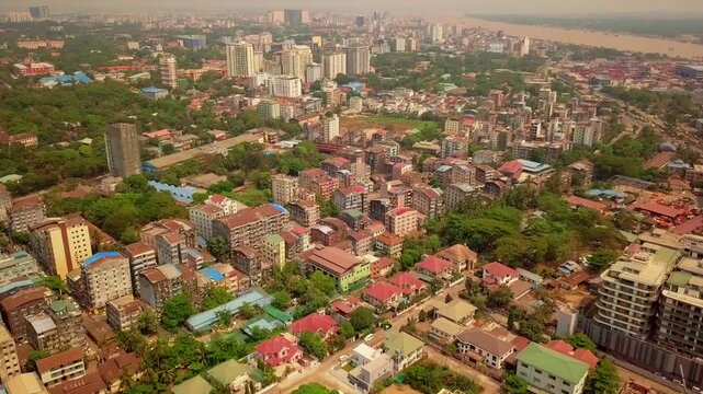  Futuristic aerial view panorama of developing Yangon city , Aerial view of Sule pagoda in downtown, Yangon, Myanmar. Sule Pagoda located in the heart of Yangon, Karaweik royal barge, Kandawgyi Lake, 