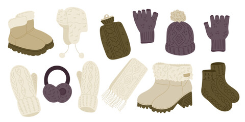 Set of winter clothes and accessories including boots, gloves, hat, scarf and earmuffs. Concept of cold weather essentials, cozy wardrobe and seasonal comfort