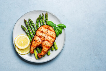 Grilled salmon fish steak and asparagus