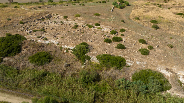 Aerial view of the ruins of the ancient Greek city of Helorus located in the Vendicari nature reserve, in the province of Syracuse, Sicily, Italy. In foreground are the remains of the  Greek theatre.