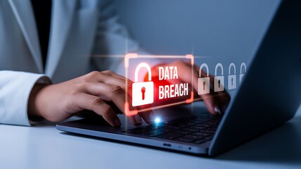 Cyber security data breach warning on laptop screen
