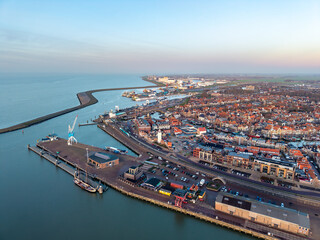 Obraz premium Aerial drone view of Harlingen city centre and harbour at sunset 