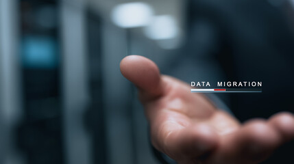 A person's hand, gracefully outstretched, symbolizes data migration. Progress is visually represented as the process unfolds.