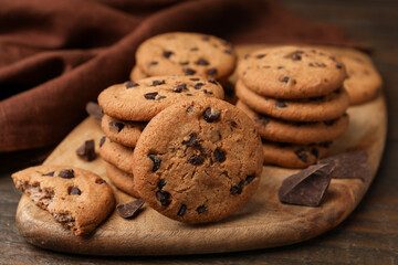 Delicious chocolate chip cookies on table, closeup
