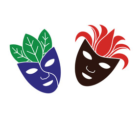 Two stylized masks one blue with green leaves one brown with red feathers.