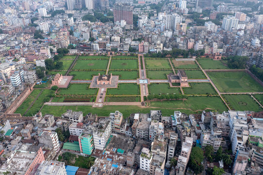 Aerial view of Lalbagh Fort's vibrant green fields and historic structures stand out amidst the dense urban sprawl, Dhaka, Dhaka Division, Bangladesh.