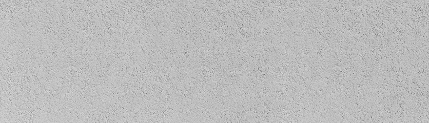 White stucco wall showing rough textured surface