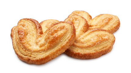 Many delicious palmier cookies isolated on white