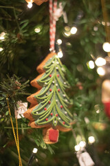 A gingerbread cookie-shaped Christmas tree ornament